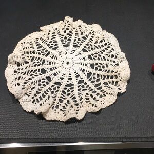13 inch handmade beautiful doily with some yellowing. Need cleaning and starchin